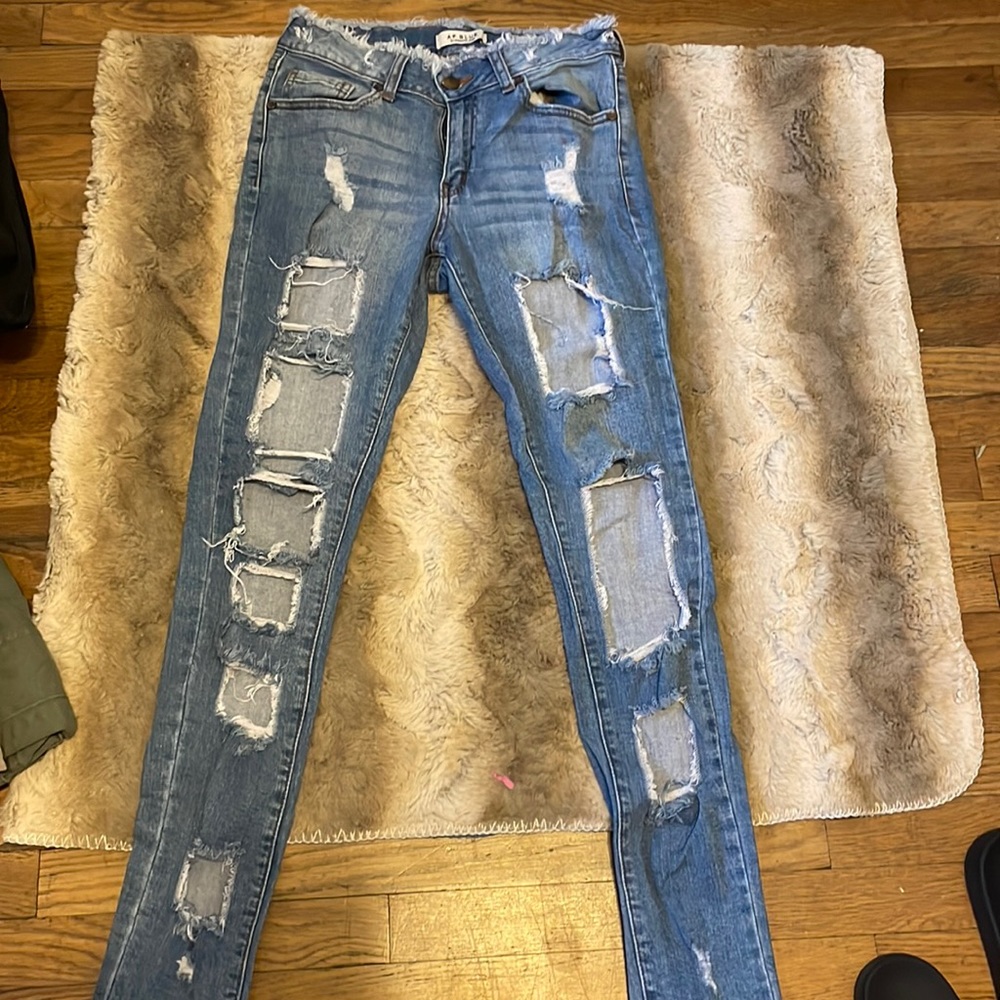 ripped light blue jeans